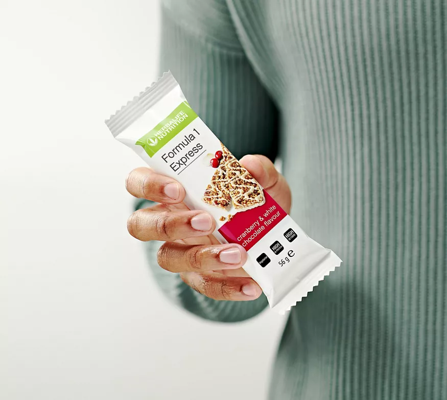 li-man-holding-cranberry-express-bar